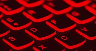computer keyboard glowing red